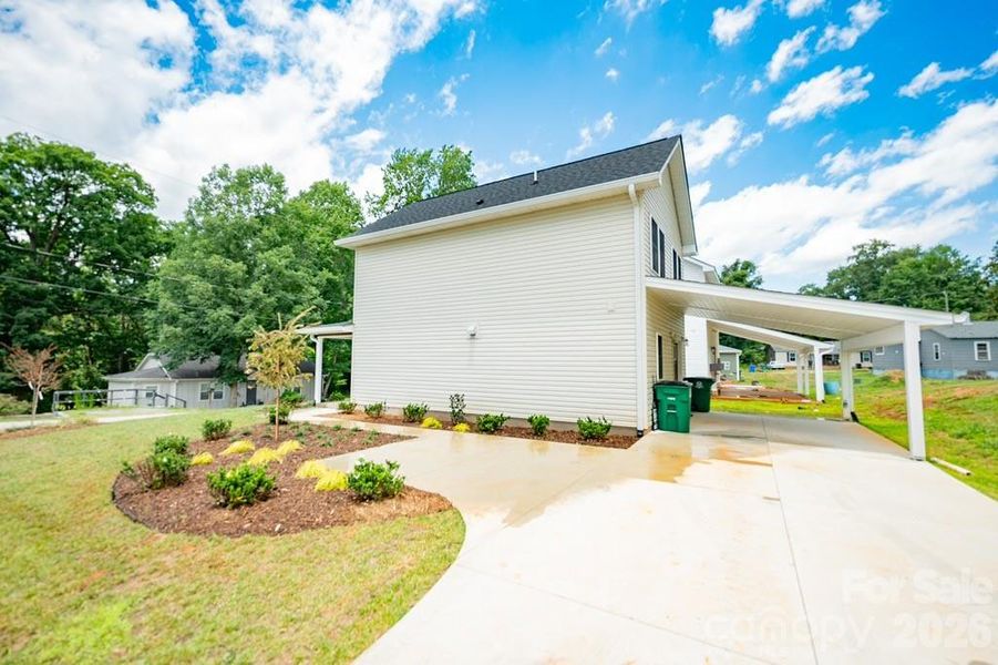 Exterior details and patio area of a home in , Spindale (Image 17).
