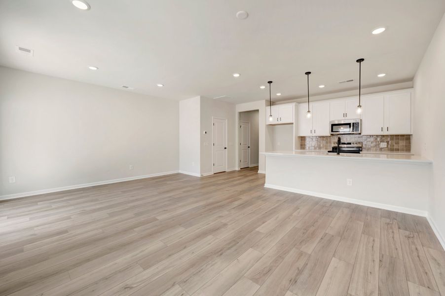 Spacious, unfurnished interior of a new home in Amplitude, Charlotte (Image 10). Spacious, unfurnished interior of a new home in Amplitude, Charlotte (Image 10).
