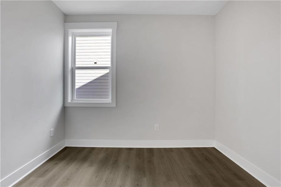 Spacious, unfurnished interior of a new home in The Paddocks at Doc Hughes, Buford (Image 31).