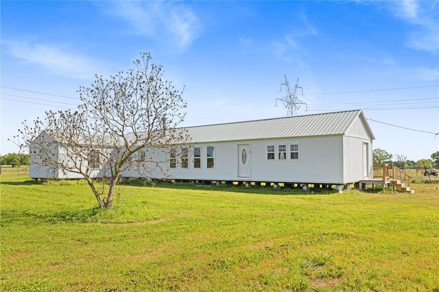 Exterior details and patio area of a home in , Iola (Image 8).