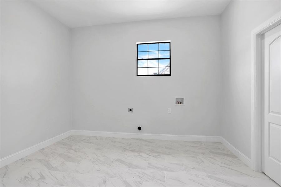 Unfurnished room featuring light tile patterned flooring