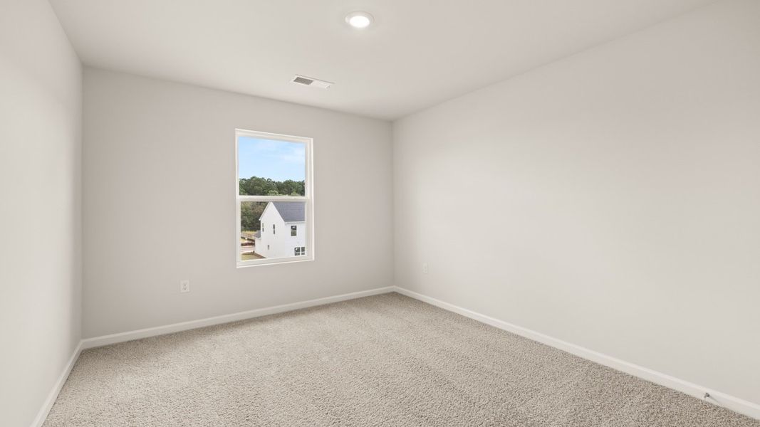 Spacious, unfurnished interior of a new home in Preserve at Dove Creek, Statham (Image 32).