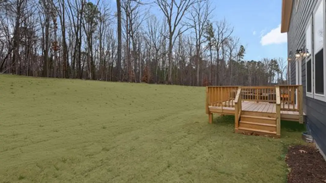 Exterior details and patio area of a home in The Estates Park, Apex (Image 4).