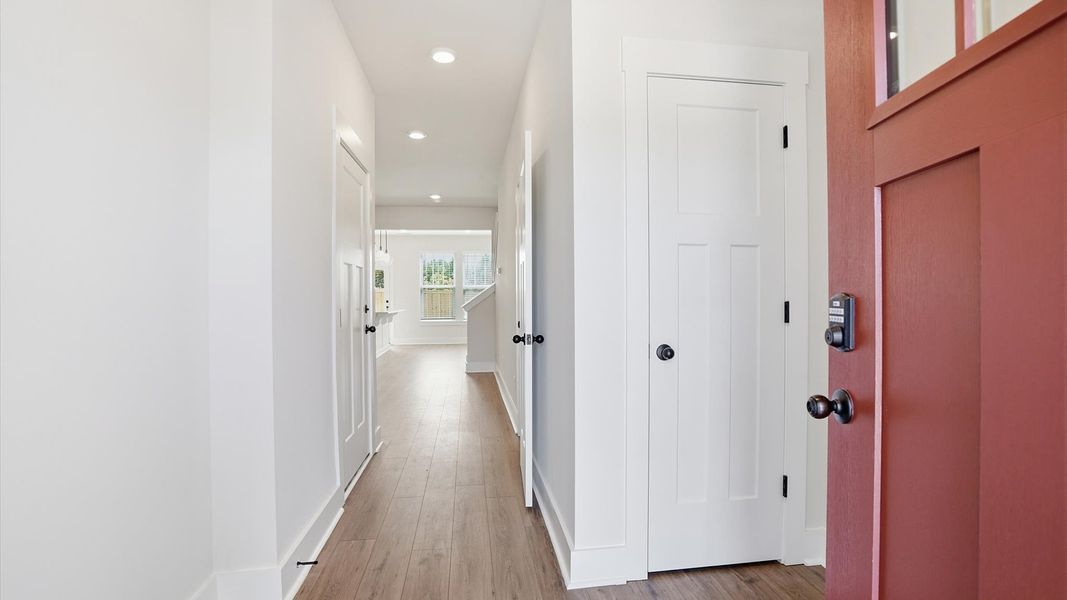 Stylish foyer with hardwood flooring and tasteful architectural detail in a superior layout at Barton Hollow Stylish foyer with hardwood flooring and tasteful architectural detail in a superior layout at Barton Hollow