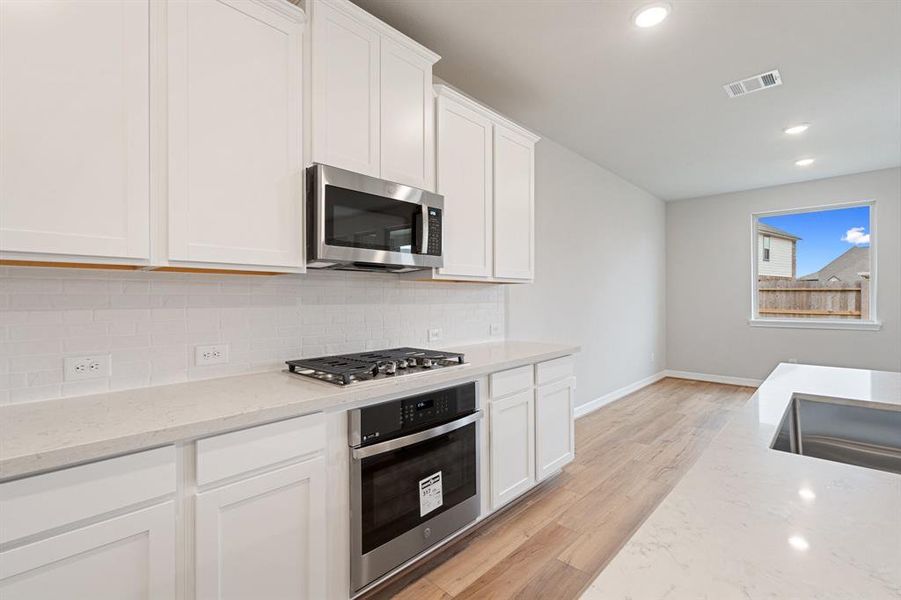 This kitchen is not only a functional space but also has ample storage. Whether you're a seasoned chef or just love to gather and enjoy good food, this kitchen is a dream come true.