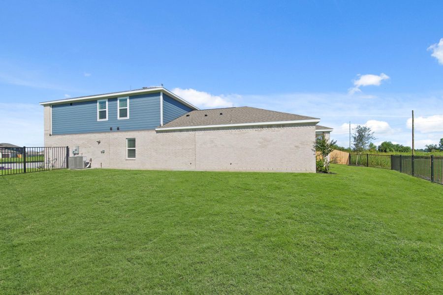 Front exterior of a new home in River Ranch Trails, Dayton, TX, highlighting curb appeal (Image 16). Front exterior of a new home in River Ranch Trails, Dayton, TX, highlighting curb appeal (Image 16).