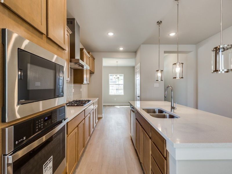 Representative furnished interior of a home built from the Roswell by Hakes Brothers in Hunters Ranch, San Antonio (Image 7).