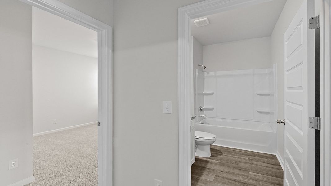 Spacious, unfurnished interior of a new home in Highland Hills, Graniteville (Image 27).
