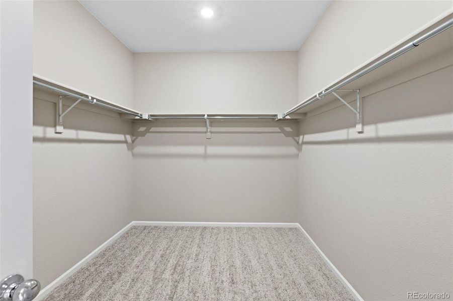 Spacious, unfurnished interior of a new home in The Cottages Collection at Ridgeline Vista, Brighton (Image 21).