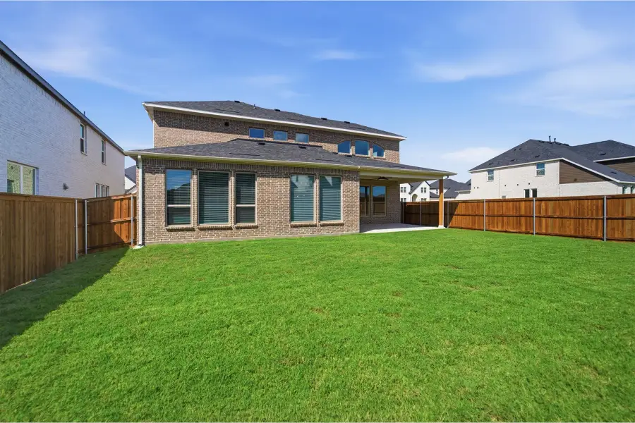 Exterior details and patio area of a home in Green Meadows, Celina (Image 30).