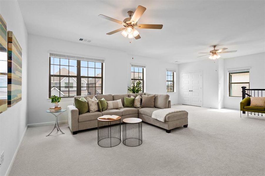 Massive upstairs loft/flex space. Perfect for movie nights or a playroom.