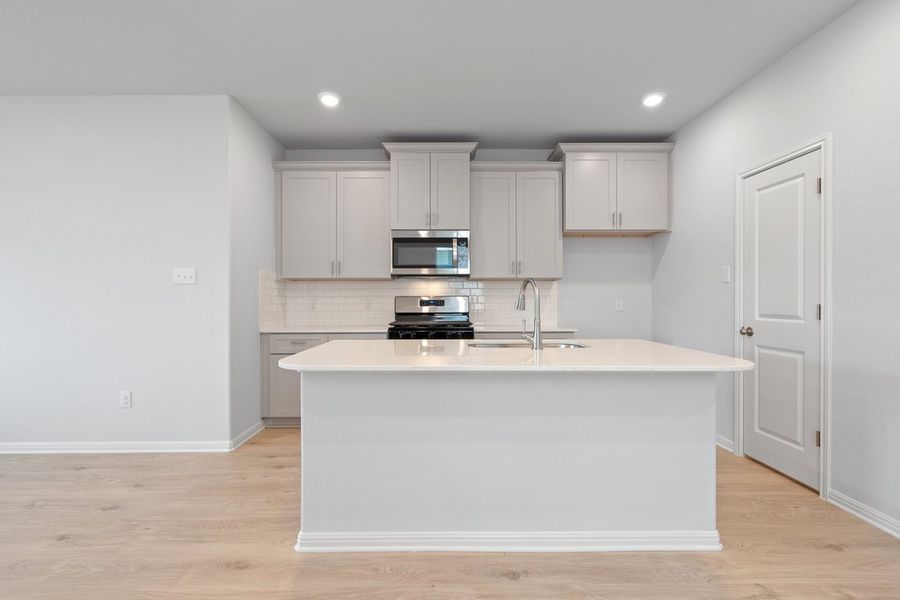 Furnished interior view inside a new home in Crosswinds, Kyle (Image 5).