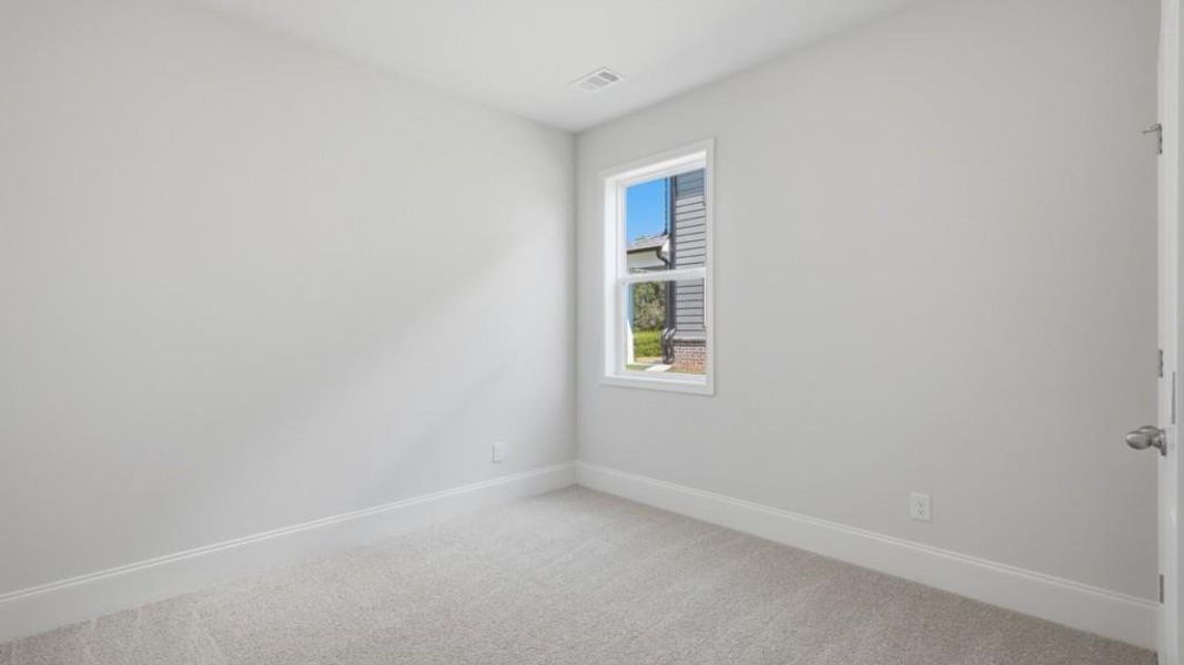 Spacious, unfurnished interior of a new home in Butner Estates, South Fulton (Image 18).