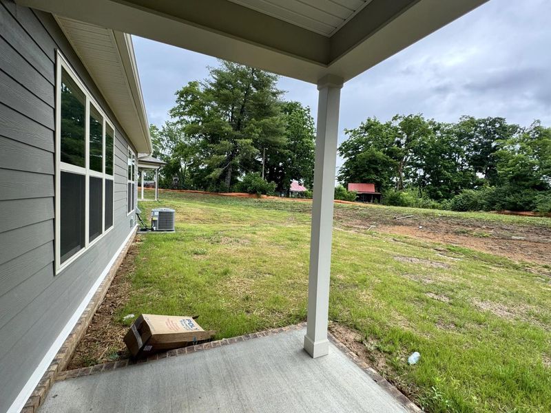Exterior details and patio area of a home in Woods Crossing, Gallatin (Image 30).