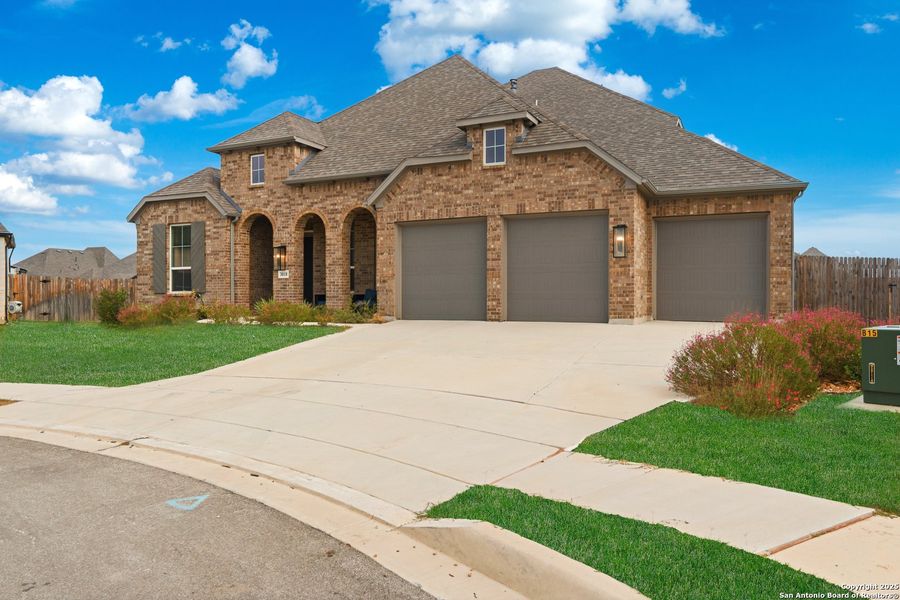 Front exterior of a new home in , Bulverde, TX, highlighting curb appeal (Image 23). Front exterior of a new home in , Bulverde, TX, highlighting curb appeal (Image 23).