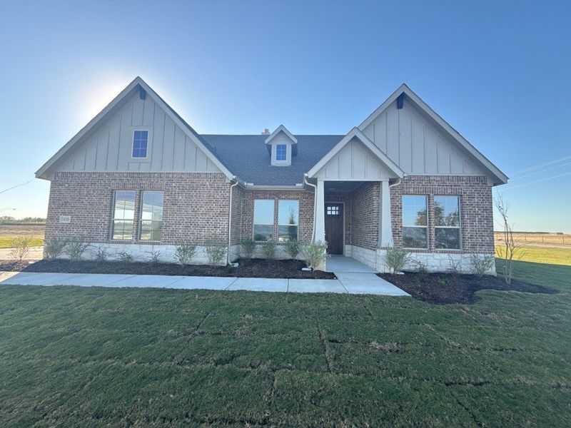Front exterior of a new home in Clear Sky Addition, Valley View, TX, highlighting curb appeal (Image 1).