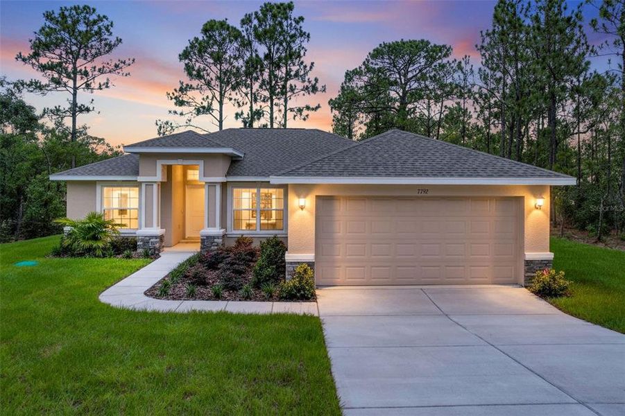 Front exterior of a new home in , Dunnellon, FL, highlighting curb appeal (Image 2).