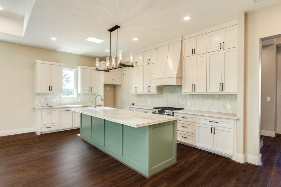 Tall ceilings and tons of natural light really make this space.  With large sliding glass doors over looking the back yard area this entire downstairs main living is ideal for relaxing evenings or gatherings.