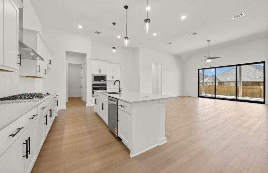 Furnished interior view inside a new home in 6 Creeks, Kyle (Image 4).