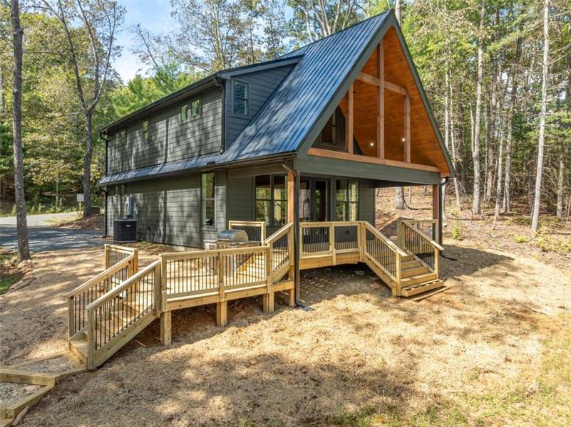 Exterior details and patio area of a home in , Ellijay (Image 4).