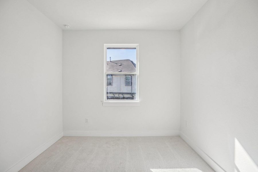Spacious, unfurnished interior of a new home in Koenig Townhomes, Austin (Image 28).