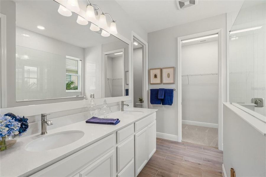 Furnished interior view inside a new home in LakeHouse Cove at Waterside, Sarasota (Image 10). Furnished interior view inside a new home in LakeHouse Cove at Waterside, Sarasota (Image 10).