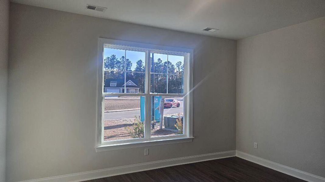 Spacious, unfurnished interior of a new home in The Enclave at French Quarter Creek, Huger (Image 15).