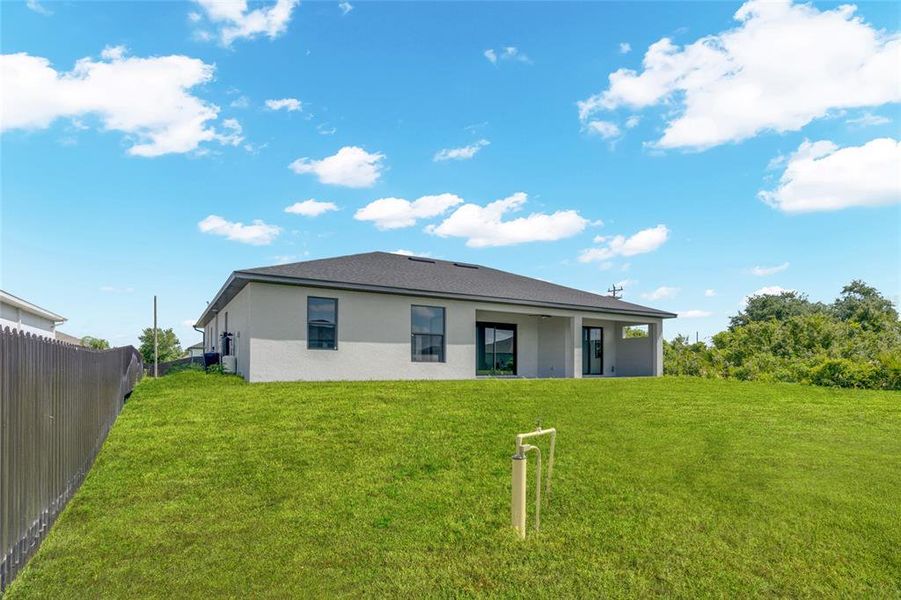 Exterior details and patio area of a home in , Lehigh Acres (Image 30).
