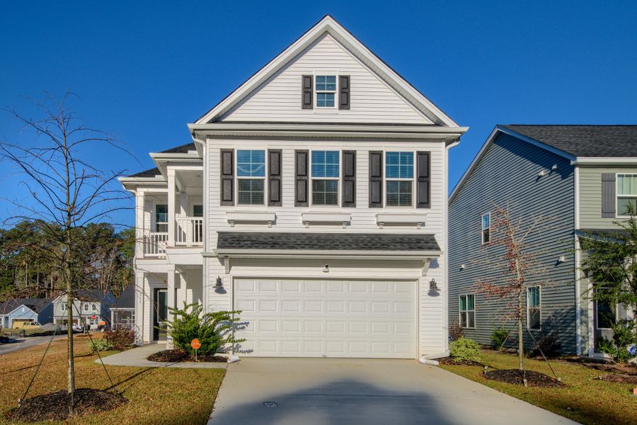 Front exterior of a new home in Six Oaks, Summerville, SC, highlighting curb appeal (Image 29). Front exterior of a new home in Six Oaks, Summerville, SC, highlighting curb appeal (Image 29).
