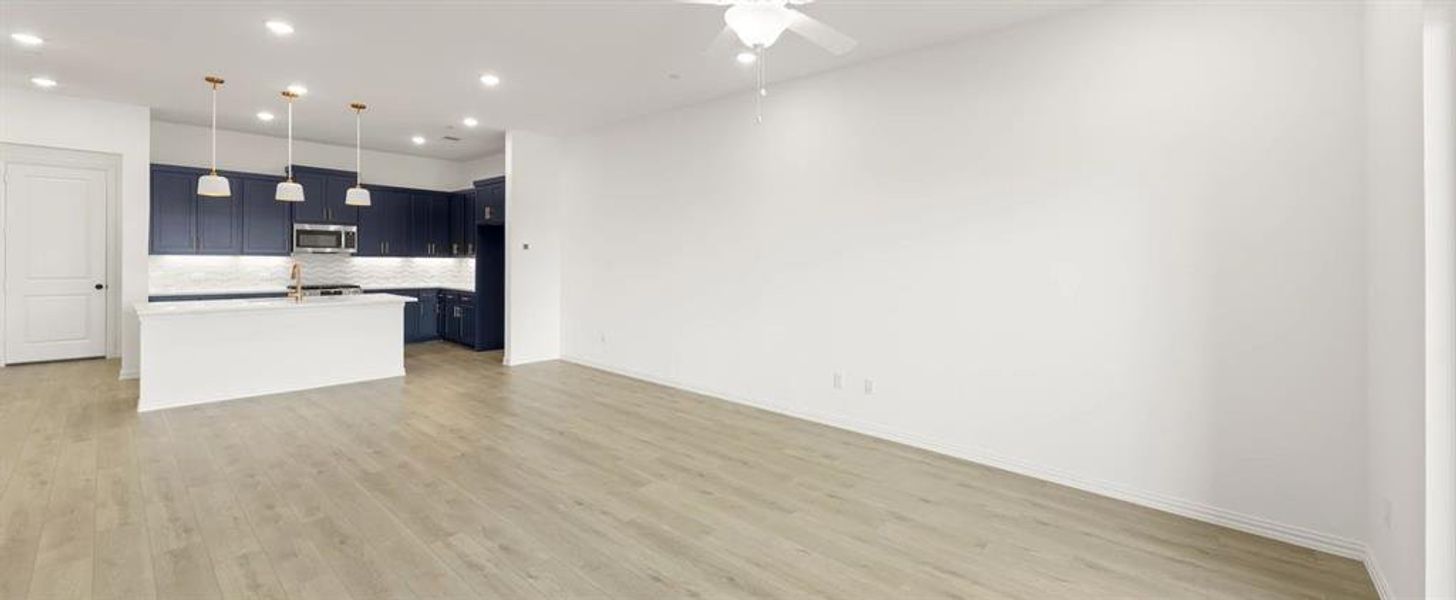 Open Kitchen-Living-Dining Room featuring the Sapphire Collection