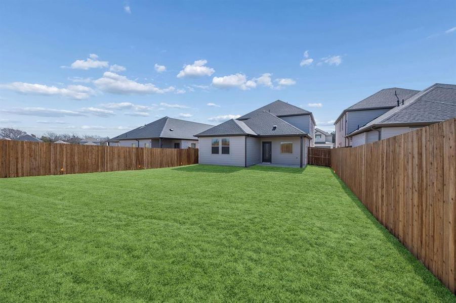 Covered Patio in the Oak II home plan by Trophy Signature Homes – REPRESENTATIVE PHOTO