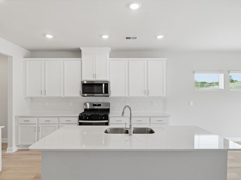 Furnished interior view inside a new home in The Farm at Wells Creek - Signature Collection, Gray Court (Image 3).