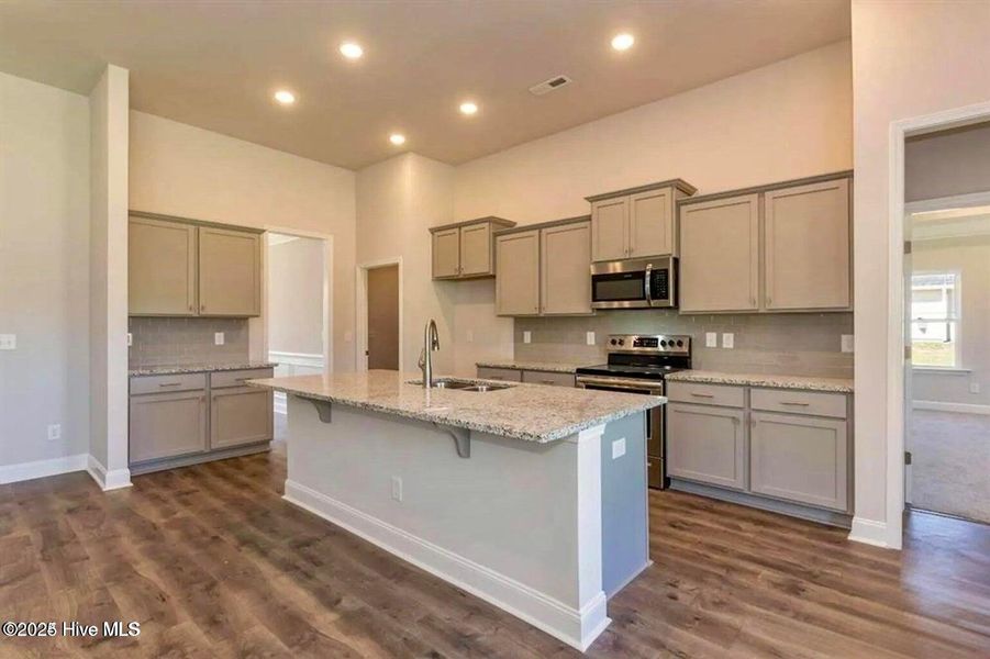Furnished interior view inside a new home in Windfield, Grimesland (Image 6).
