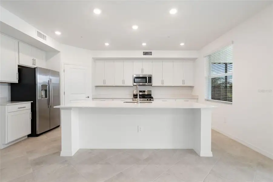 Furnished interior view inside a new home in Calusa Country Club, Lakewood Ranch (Image 11).
