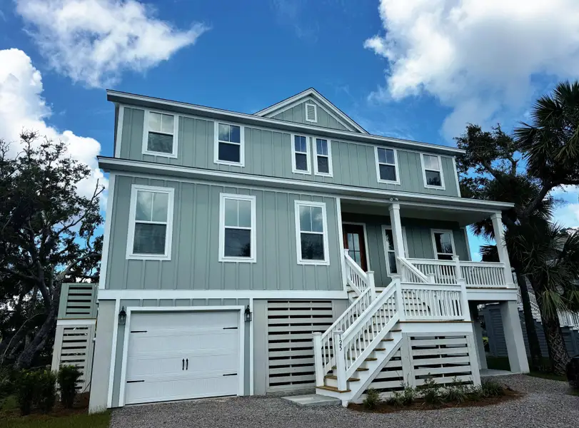 Front exterior of a new home in , Edisto Island, SC, highlighting curb appeal (Image 2). Front exterior of a new home in , Edisto Island, SC, highlighting curb appeal (Image 2).