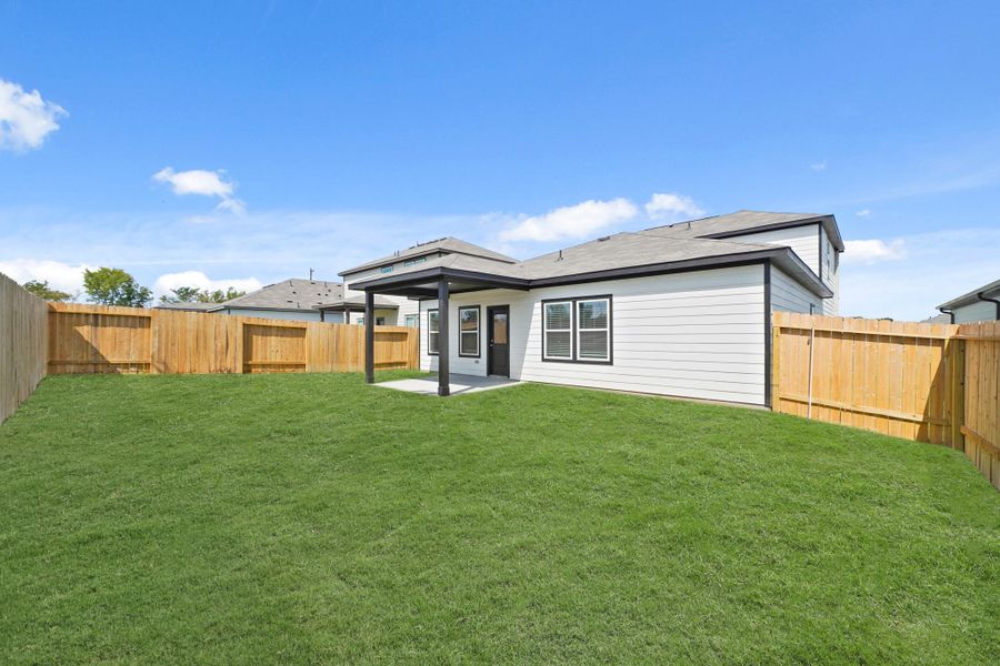 Exterior details and patio area of a home in Reveille Estates, Bryan (Image 2).