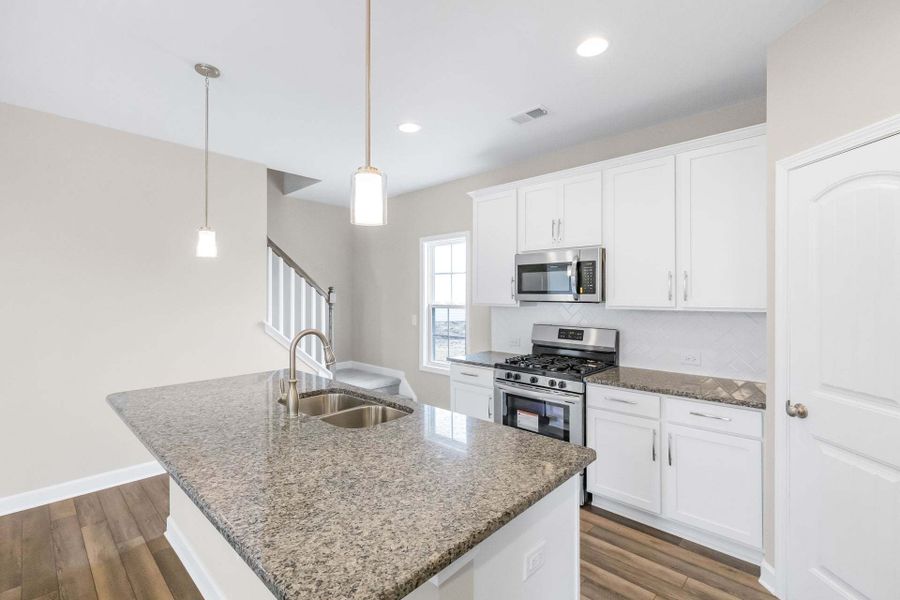 Representative furnished interior of a home built from the Aberdeen by Caviness & Cates Communities in Bartlett Manor, Youngsville (Image 136).