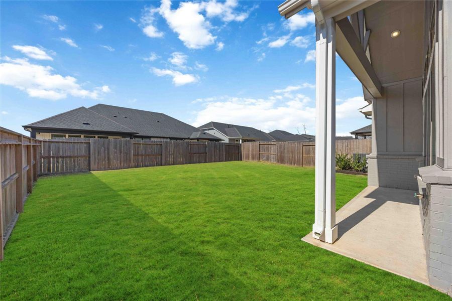 Exterior details and patio area of a home in Sienna, Missouri City (Image 4). Exterior details and patio area of a home in Sienna, Missouri City (Image 4).