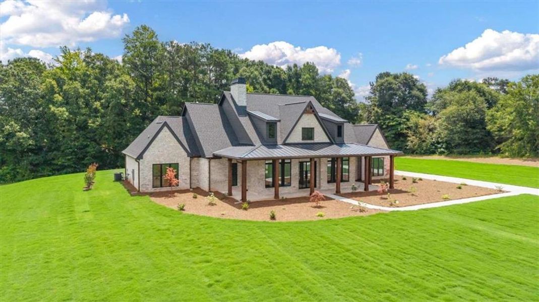 Front exterior of a new home in , Carrollton, GA, highlighting curb appeal (Image 32).