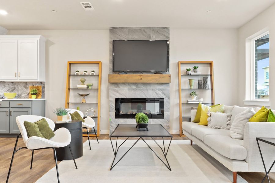 Representative furnished interior of a home built from the Cypress (RE) by Grenadier Homes in Wildridge, Oak Point (Image 3).