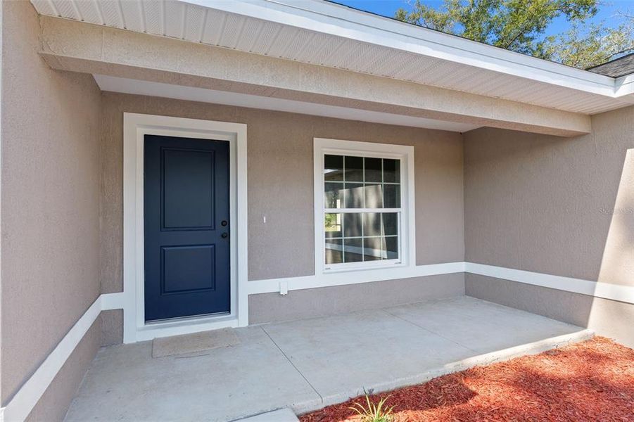 Front exterior of a new home in , Citrus Springs, FL, highlighting curb appeal (Image 25).