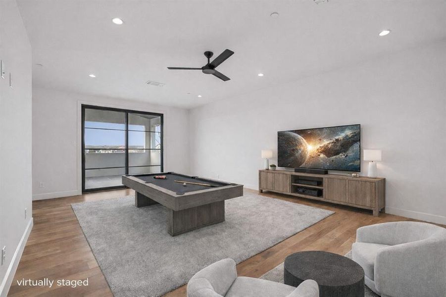 Game room upstairs - virtually staged Game room upstairs - virtually staged