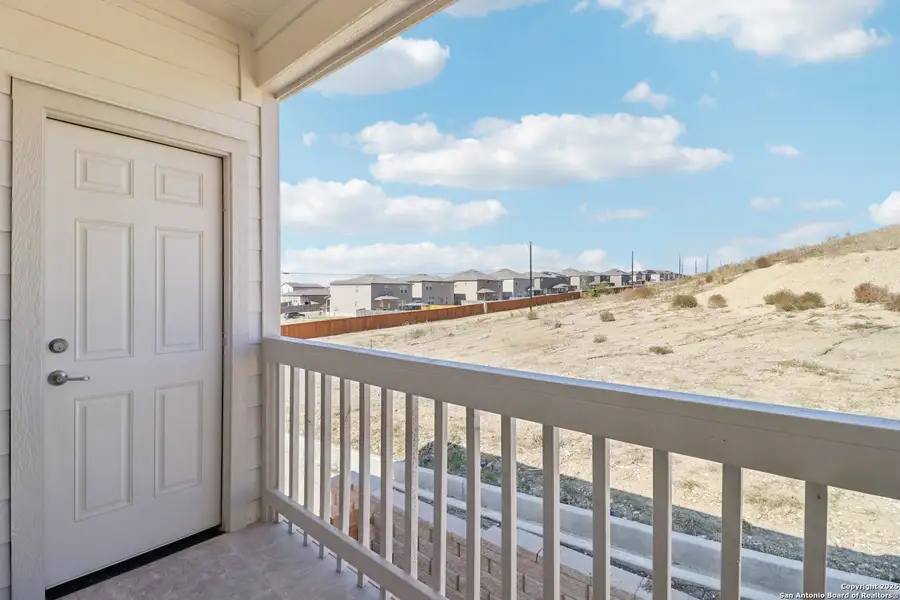 Exterior details and patio area of a home in Magnolia Village North, San Antonio (Image 3).