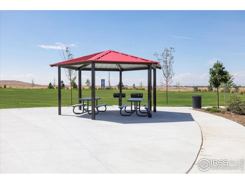 Front exterior of a new home in Settlers Crossing, Commerce City, CO, highlighting curb appeal (Image 2).