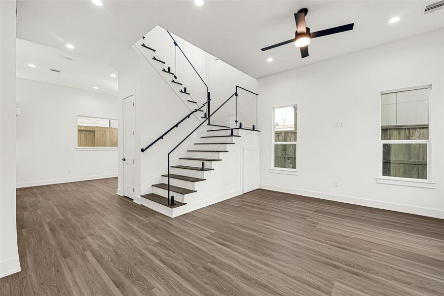 Entry View of Livingroom and Luxury Staircase