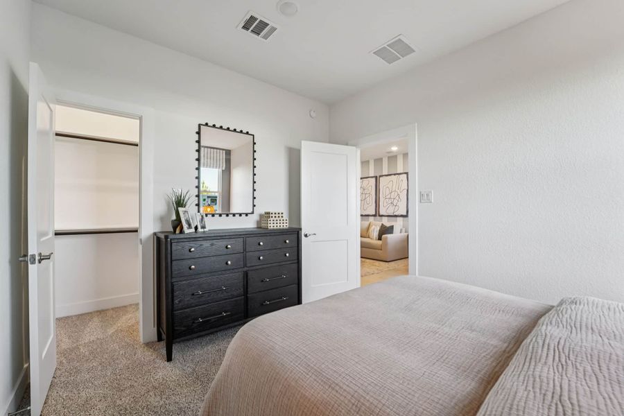 Furnished interior view inside a new home in Bridgeland, Cypress (Image 33).