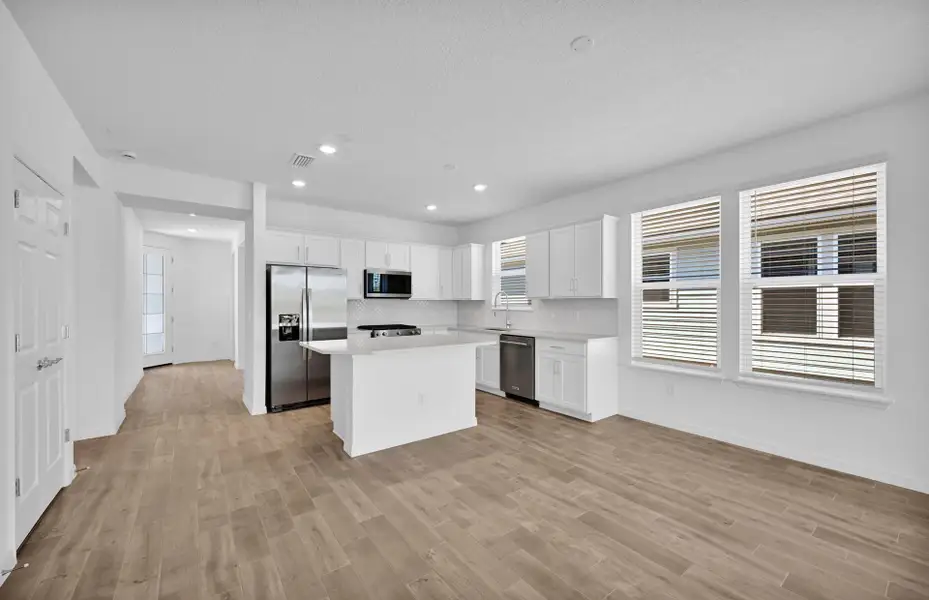 Furnished interior view inside a new home in Del Webb Wildlight, Yulee (Image 3).