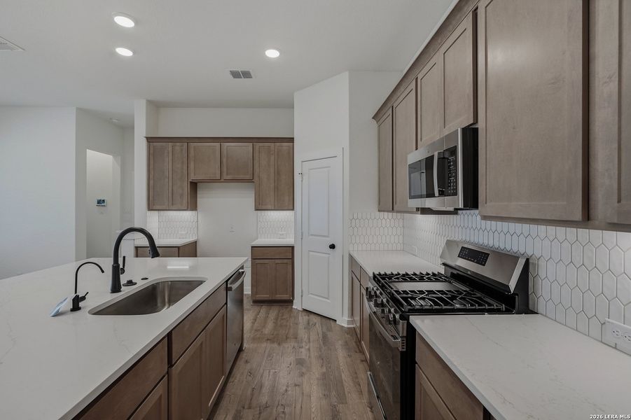 Furnished interior view inside a new home in The Crossvine, Schertz (Image 14).