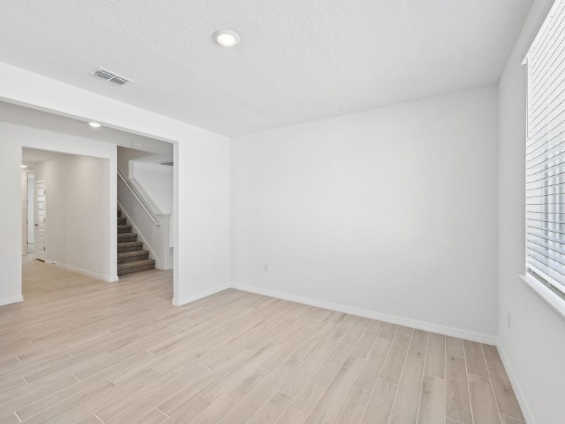 Spacious, unfurnished interior of a new home in Oakfield Trails - Signature Series, Parrish (Image 7).