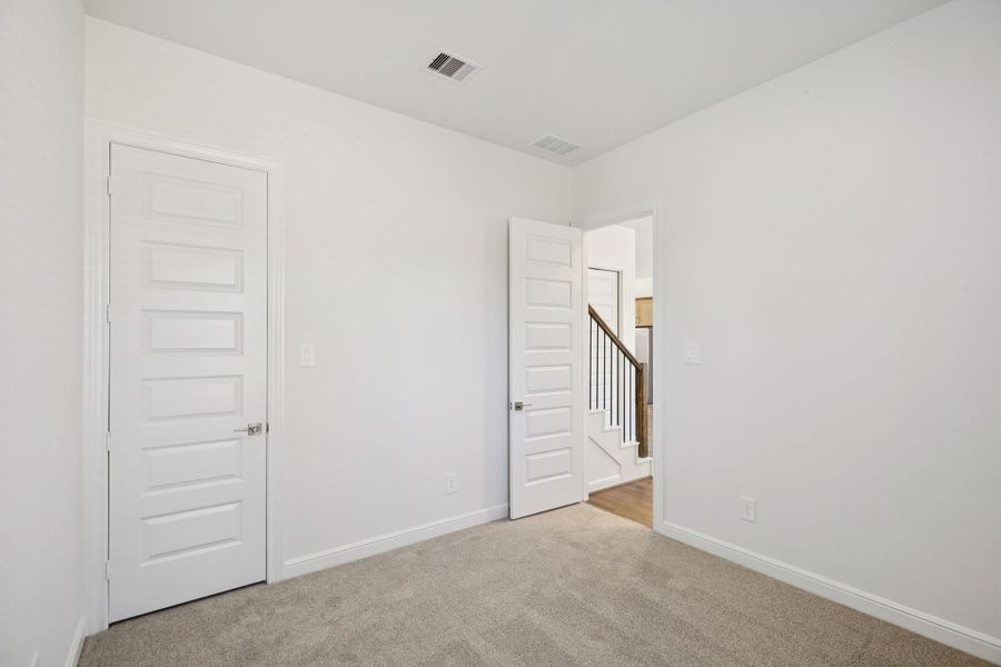 Spacious, unfurnished interior of a new home in Pinewood Trails - Luxe Series, Atascocita (Image 38).